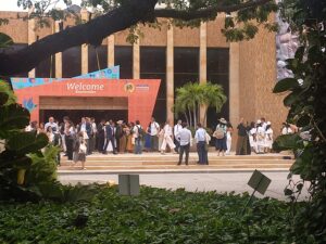 Why the post-fossil era requires global democracy and a global GHG market?